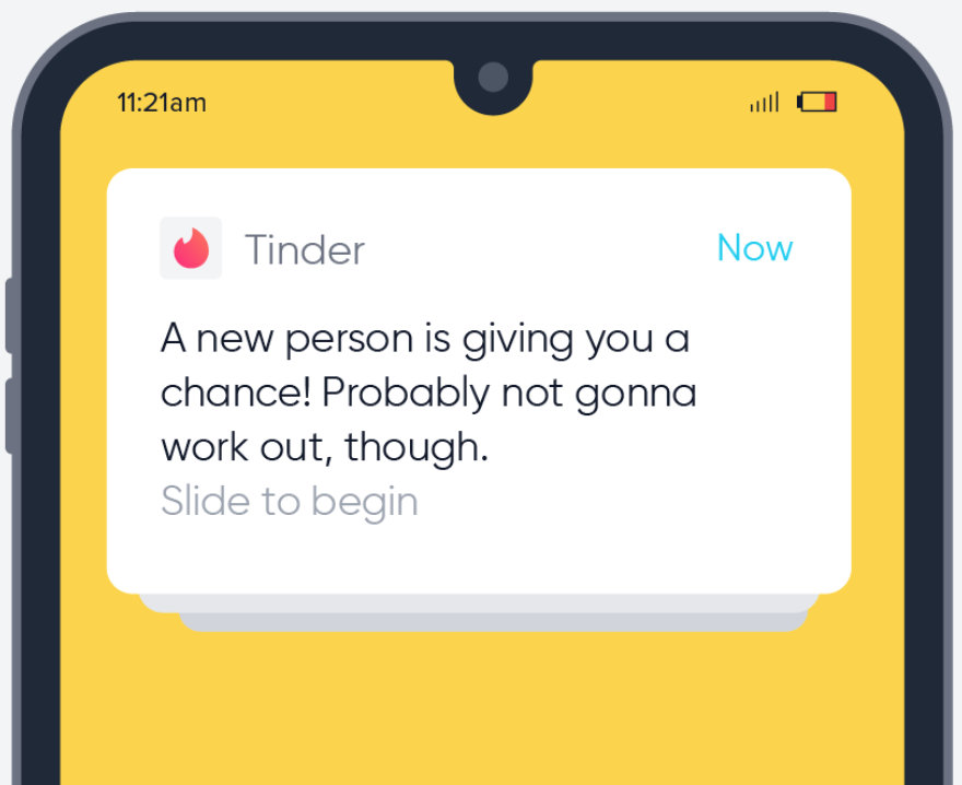 phone screen showing a notification from Tinder