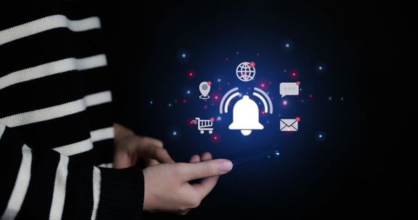 mobile phone showing floating icons with notifications